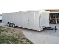 8.5 X 32 Silver Flat Nose Enclosed Trailer With (3) 7K Axles